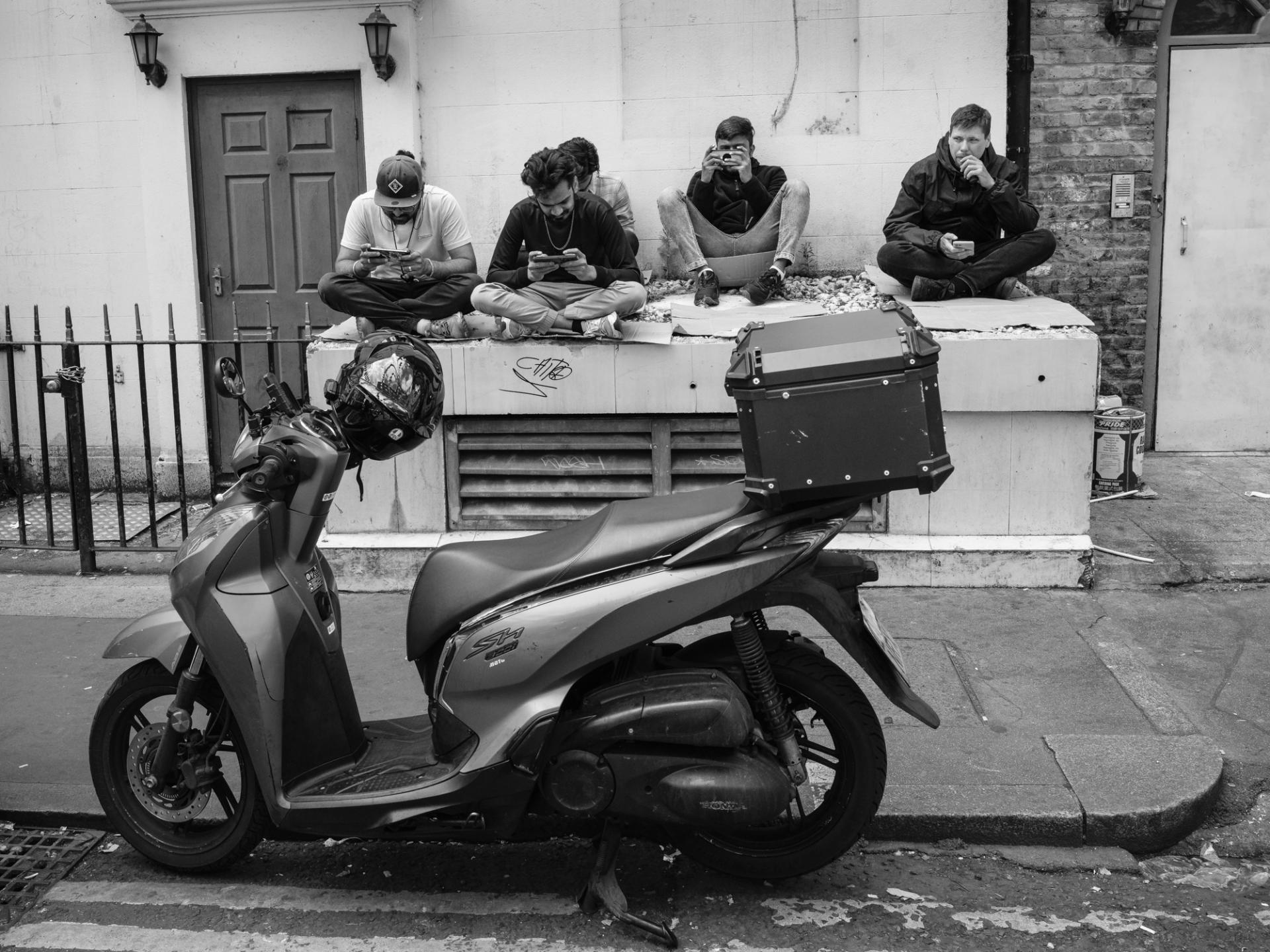 Global Photography Awards Winner - Scooter Drivers On A Break