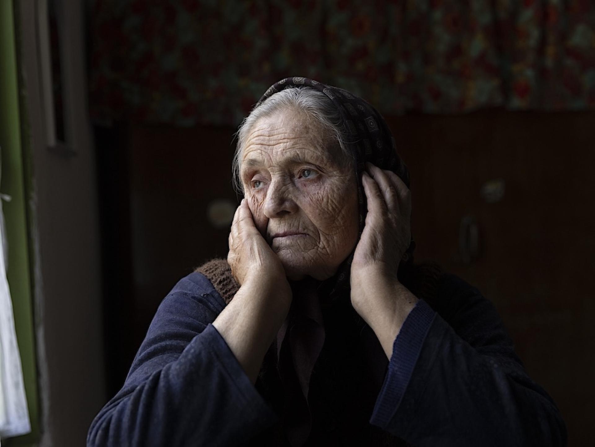Global Photography Awards Winner - WOMEN HOLDING