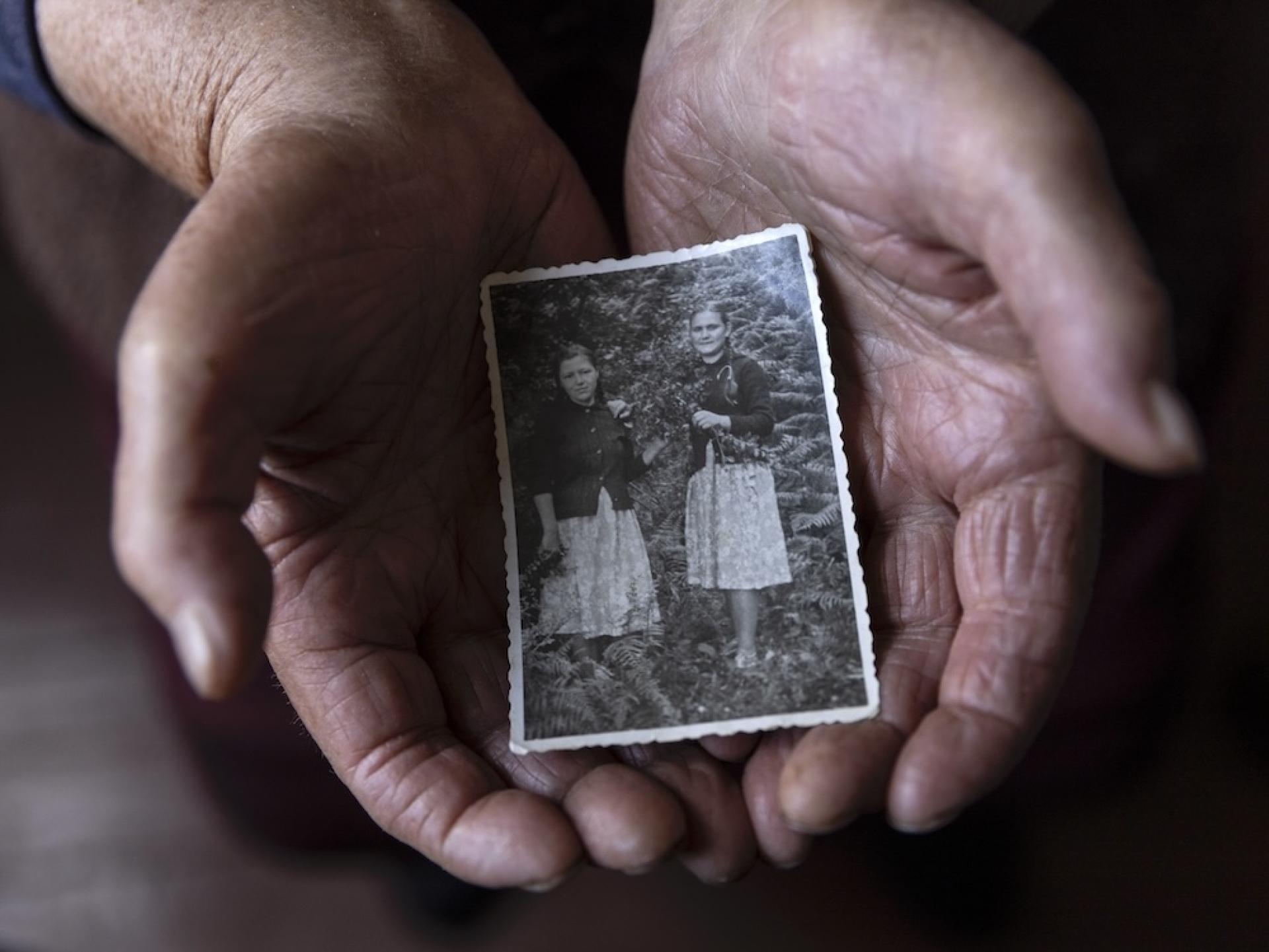 Global Photography Awards Winner - WOMEN HOLDING